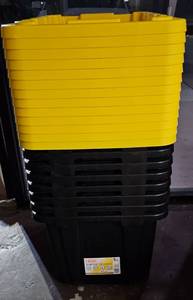 lot 232 image: Seven Black and Yellow 27 Gallon HDX Totes with Lids