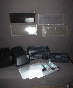 lot 31 image: Several Plastic paper organizersholders and Amex Clipboards