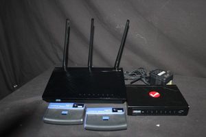 lot 85 image: Asus Wireless Dual Band Router, 8 Port Switch, and 2 Wireless Network Adaptors