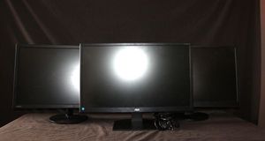 lot 97 image: Three Computer Monitors
