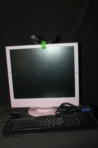 lot 102 image: Pink computer monitor and keyboard