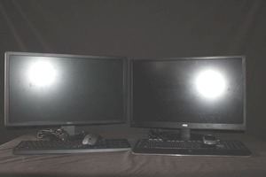 lot 104 image: Two Monitors AOV and Dell, Two Keyboards and Two Mouse and Cables