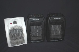lot 123 image: Three electric space heaters