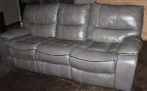 lot 137 image: Leather dual reclining sofa