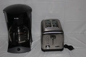 lot 140 image: Black coffee Maker and stainless steel toaster