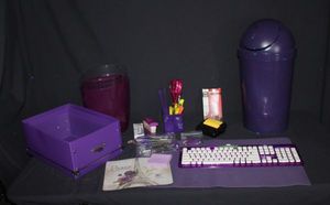 lot 145 image: Purple Desk Set, including wireless keyboard, trash can, decorative boxes, pen holders and pens, stapler and mouse pad
