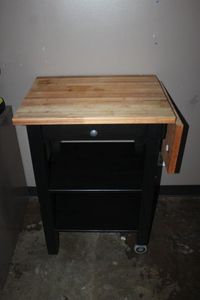 lot 164 image: Movable Wooden Island type table with folding Side
