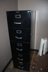 lot 185 image: Tall Black Metal Filing Cabinet no key