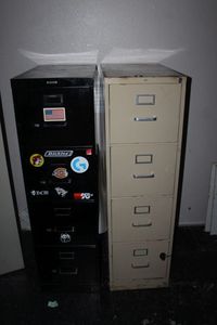 lot 219 image: Two Tall Metal Filing Cabinets