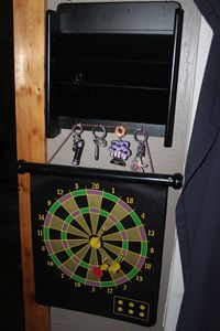 lot 220 image: Keyholder holder and dart game
