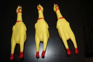 lot 237 image: Three Yellow rubber screaming chicken toy