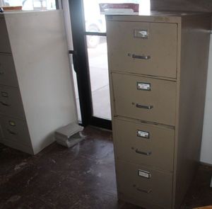 lot 241 image: Two four drawer file cabinets