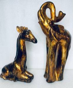 lot 14 image: Lot Of 2 - Elephant Approx. (19 12 x 9 x 5) & Giraffe Approx. (14 12 x 9 12 x  5) Decor Pieces - In Condition As Shown