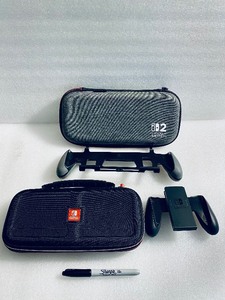 lot 90 image: Lot Of 4 - Various Nintendo Switch System Accessories - In Condition As Shown