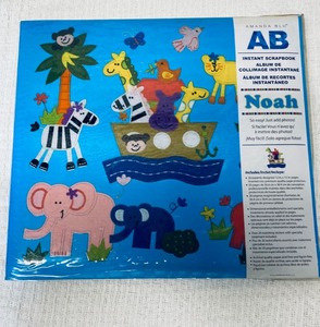 lot 264 image: Amanda Blu Noah Theme Instant Scrapbook With 12 x 12 Pages - In Condition As Shown