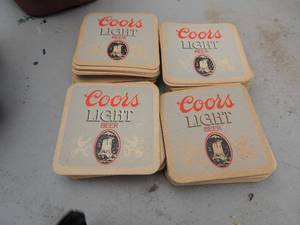 lot 76 image: Coors light coasters