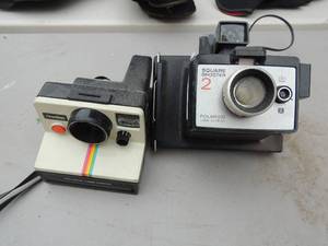 lot 75 image: Polaroid  square shooter  and Polaroid land camera one step