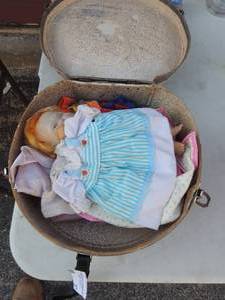 lot 37 image: Vintage Doll with wardrobe and wardrobe pieces