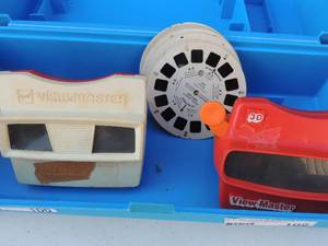 lot 102 image: View master red & blue plus case and disks Michael Jackson thriller, surfs and sesame street