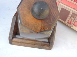 lot 105 image: Cookie Jar in wood cradle