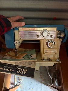 lot 71 image: ALDENS Zig Zag sewing machine Model 2000 in cabinet