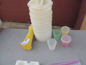 lot 41 image: vintage Tupperware hamburger press and freezer keeper x10 Mustard