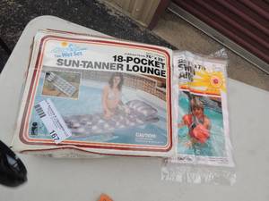 lot 167 image: NIP  Sun Tanner lounge and swim accessories