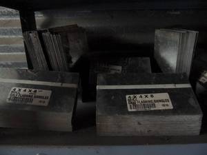 lot 204 image: Galvenized flashing shingles 100 per bundle 4x4x x 7
