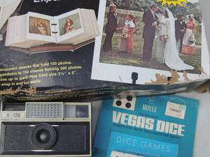 lot 219 image: Rolodex photo file, dice, camera
