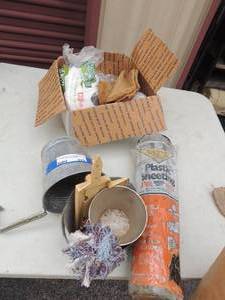 lot 225 image: MR. PEANUT BAG, ROLL OF PLASTIC, SMALL BUCKET, RAIN GAUGE