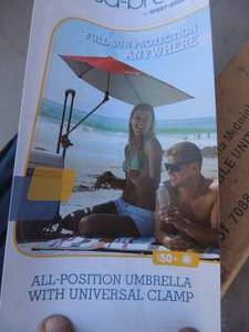lot 306 image: NIB Versa brella all position with clamp