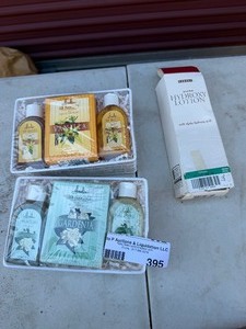 lot 395 image: 2 gift baskets and hydroxy LOTION
