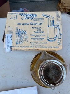 lot 405 image: Wrinkle away & ashtrays