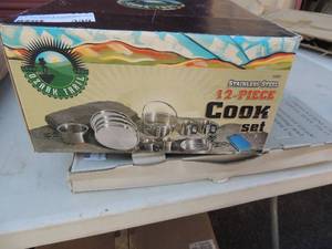 lot 339 image: NIB Ozark trail 1 piece cook set