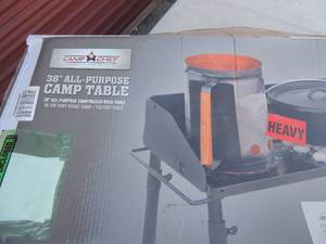 lot 358 image: Camp Chef 38 all purpose table  Dutch oven table  new In box