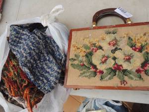 lot 446 image: wood purse and knitted scarves