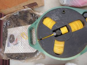 lot 449 image: Water hose on reel and jumper cable bag