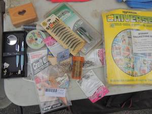 lot 527 image: Hair brush, clips, bead ponytail holder  Pen set and coin collection kit