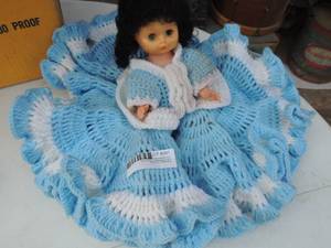 lot 591 image: Doll with crochet dress