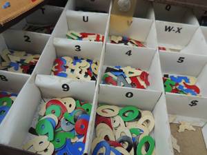 lot 613 image: Box with 4 trays of letters and numbers