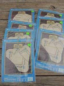 lot 660 image: Cross stich napkins 4 in pak x 7 packs