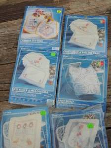 lot 28 image: EMBroidered KITS - INFANT  - BIBS, CRIBSHEETSW CASE X , BABY QUILTS  QTY 3