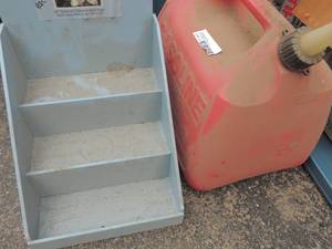 lot 683 image: Small shelf and gas can