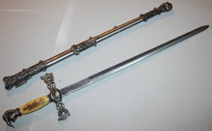 lot 101 image: Masonic Knights Templar ceremonial sword with knights head pommel and ornate scabbard