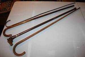 lot 109 image: walking stick featuring a carved horse head and other walking canes see pictures