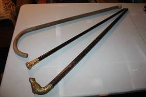 lot 111 image: walking sticks featuring  horse head handle and others see pictures for details