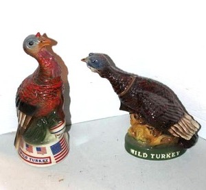 lot 124 image: vintage Austin Nichols Wild Turkey ceramic liquor decanters.