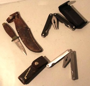 lot 131 image: miscellaneous camping tools, including a multi-tool and a sheath knife
