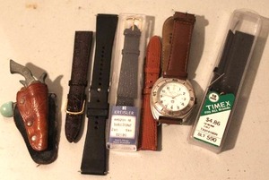 lot 135 image: a Field & Stream Mens silver-tone quartz wristwatch & vintage miniature gun set with a tooled leather holster & vintage Timex watch strap and others see pictures