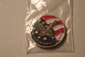 lot 186 image: an Operation Iraqi Freedom challenge coin